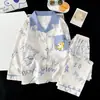 Conjunto de pijama de manga larga para niños para primavera y otoño, corte holgado, elegante ropa de casa de seda helada para niños, adecuado para niños mayores, ropa para aire acondicionado