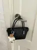 Bolso tejido de alta gama vintage para mujer, nuevo bolso cruzado versátil de moda 2026, bolso de mano para el trabajo, bolso de hombro tipo cubo