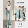 Jeans de Tiro Alto Rasgados Micro Acampanados para Mujer Primavera y Verano 2025 Nuevos Pantalones de Pierna Ancha Acampanados para Alargar la Figura con Borde Crudo hasta el Suelo