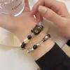 Pulsera de Gato con Perlas Negras Estilo Dulce Fresco Nicho Pulsera Linda Vintage de Perlas Agrietadas por el Hielo Estilo Frío de Ins