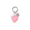 Nuevo llavero decorativo multicolor de resina con forma de corazón para llaves de coche, versátil y creativo.