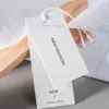 Nossa Fábrica Personaliza Cartão Branco, Papel Couchê, Etc.. Etiquetas Personalizadas para Roupas, Sapatos e Meias Podem Adicionar Impressão Colorida do Logotipo, Hot Stamping e Relevo