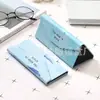 Fabricantes de cajas de gafas plegables triangulares portátiles personalizadas al por mayor para estudiantes hombres y mujeres, estilo coreano pequeño, fresco, lindo, personalidad creativa