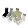 Calcetines Apilados Estilo Coreano Primavera 2026 con Etiqueta de Tela, Calcetines de Algodón Sencillos, Calcetines Transpirables de Media Pantorrilla para Mujer, Calcetines Sin Costuras Absorbentes de Sudor al por Mayor