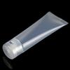 Fornecimento de fábrica frasco de creme 50g frasco de loção de plástico PE flip transparente frasco com mangueira pode ser impresso
