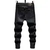 Jeans negros de alta gama para hombre, marca de moda, nuevo estilo otoño e invierno 2022, pantalones ajustados skinny casuales versátiles elásticos