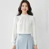 Tiro real alta calidad camisa de gasa de manga larga color albaricoque francés para mujer chic suelta diseño que cubre el abdomen sentido de diseño top de nicho