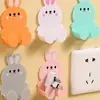 Gancho de Almacenamiento Lindo para Enchufe sin Taladro para Uso Doméstico, Sujetador Fuerte Adhesivo sin Rastro para Cables y Enchufes de Pared de Cocina