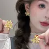 Pendientes de Flor Dorada y Perla de Venta Caliente para Mujer, Diseño Dulce y Único, Simples y Elegantes, Pendientes Versátiles