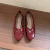 Zapatos de mujer estilo francés con lazo y estampado de leopardo, de fondo plano, 2026 primavera/otoño, zapatillas de ballet rojas para combinar con faldas