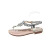 Sandálias de Verão Novas 2024 Estilo Coreano Feminino Estilo Fada Rasteirinhas Tira de Dedo Elaine Sandálias Bohemianas com Strass