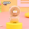 Ventilador de mão pequeno portátil fofo de desenho animado mini ventilador portátil com carregamento USB ventilador elétrico para estudantes crianças atacado