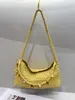 Bolsa de Ombro Único para Axila Quente de Vendas Transfronteiriças 2026 com Design de Nicho, Bolsa de Mão Mãe-Filha para Mulheres, Bolsa de Bolinho Trançada Leve e Fashion