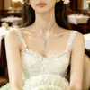 Moda Estilo Caliente Oro Blanco Electrochapado Cruz Turquesa de Imitación Collar Lujo Ligero Nicho Joyería para Pareja para Mujer Gama Alta