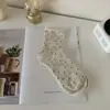Calcetines de lunares rizados calcetines de tubo medio para niños ins de moda finos primavera y otoño calcetines de felpa jk japoneses calcetines de tubo medio para estudiantes primavera y verano