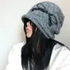 Gorro de punto retro estilo coreano con lazo, un sombrero cálido y elegante para mujer, perfecto para otoño e invierno, ofreciendo protección contra el frío y cubriendo las orejas.
