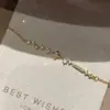 Nova pulseira de diamante com estrela de quatro pontas para mulheres, elegante, luxo leve, nicho, sensação de alta qualidade, doce, fofa, moderna e versátil
