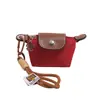 Mini Bolsas Pequeñas Transfronterizas para Mujer 2025 Nuevo Modelo Bolsa para Labial Auriculares Bolsa Tipo Dumpling Estilo Coreano Cartera Personalizada Al por Mayor