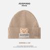 Estilo coreano estilo ins etiqueta de tecido de urso infantil Pulôver de cor sólida Chapéu de lã tricotado Chapéu de lã quente para bebê outono e inverno