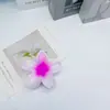 Pinza para el pelo de estilo vacacional romántico y colorido, popular transfronteriza, con flor de plumeria, accesorio floral fresco para el cabello para mujer