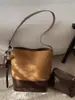 Bolsa Tote de Grande Capacidade para Mulheres 2025 Mais Vendida Estilo Coreano Moda de Luxo Versátil para o Dia a Dia Retro Tendência Bolsa de Ombro