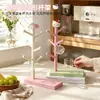 Bonito estante organizador de tazas de escritorio My Melody con bandeja de drenaje para tazas de agua, tazas de café, juegos de té y tazas pequeñas