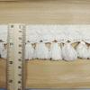Todo el año en stock encaje de hilo de algodón puro blanco y negro con borlas colgantes de encaje accesorios de ropa DIY falda de mujer