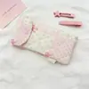Estojo floral acolchoado estilo coreano com grande capacidade, aba flip e botão de pressão, caixa de papelaria estudantil multifuncional e necessaire