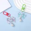 Llavero accesorio con colgante de perla y lazo de lunares color caramelo de resina, charm para bolso de cuentas, venta al por mayor de joyería