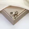 Broche Transfronterizo Nuevo de Alta Gama Lazo Insecto Flor Femenino Anti-Exposición Fijo Ropa Versátil Corsage