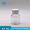O animal de estimação 50ML com a garrafa líquida transparente grossa da escala pode ser equipado com a garrafa resistente aos ácidos do alimento do copo de medição