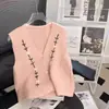 Chaleco de Punto con Bordado Floral y Cuello en V Estilo Retro para Mujer Primavera 2026 Top de Chaleco de Punto Artístico en Capas