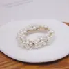 Nueva diadema de perlas para el cabello cuerda para el cabello de niña flor para el cabello diadema banda de goma cuerda para el cabello de moda redonda accesorios para el cabello al por mayor