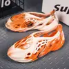 Sandalias de Pareja para Hombre y Mujer Primavera y Verano Nuevas Coreanas Camuflaje Zapatos de Agujeros de Coco Baotou Transfronterizas Tallas Grandes Sandalias de Playa para Hombre