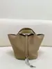 2025 Nova Bolsa Cesta de Couro TC de Alto Padrão com Ferragens de Aço Costurada Semi-Manualmente com Linha Encerada Bolsa Tote Versátil