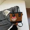 Versão Coreana Bolsa de Mão de Nicho Bolsa Saco para Mulheres Outono e Inverno 2025 Nova Bolsa de Ombro Acolchoada Bordada para Trabalho e Deslocamento Bolsa Transversal