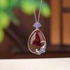 Yilu plata S999 plata pura ámbar sangre marea nacional esmalte urraca flor de ciruelo colgante hueco de gota de agua boda ceja colgante de plata