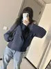 Esta chaqueta corta de plumón extragrande con un gran cuello de piel sintética es increíblemente elegante.. Es un abrigo de invierno para mujer para 2026, diseñado para figuras petite, y cuenta con un nuevo forro de algodón más grueso.