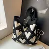 Bolsa de Hombro Cruzada de Otoño 2026 Nueva Moda Estilo Francés Casual para Viajar Gran Capacidad para la Playa, Debajo del Brazo, Tejida