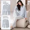 Conjunto de pijama feminino de primavera e outono, com mangas compridas, calças compridas, 100% algodão, com sutiã embutido, apresentando um design de desenho animado, gola redonda e estilo pullover, adequado para usar como roupa de casa.