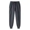 Pantalones de chándal de forro polar para hombre y mujer de 19 colores Leggings de placa ligera Pantalones de chándal Cintura elástica Pantalones de lápiz Pantalones Productos de fábrica al por mayor