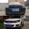 Adecuado para Tiguan 13-17 parachoques de red modificado calcomanía de coche de fibra de carbono calcomanía de decoración de carrocería