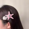 Pinza para el pelo con forma de estrella de mar y concha de perla, estilo resort costero, incrustada de diamantes, sensación de lujo ligero y alta gama, accesorio de moda para el cabello para mujer