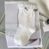 Etiqueta de tela de encaje para primavera y otoño Calcetines de encaje Jk Lolita Calcetines de media pantorrilla para mujer Estilo Preppy Niñas Calcetines de moda en blanco y negro Algodón