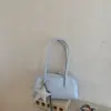 Bolsa de mão popular de nicho coreana, bolsa baguete para mulheres, nova moda de verão 2026, versátil, grande capacidade, bolsa de ombro tipo travesseiro