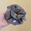 Goma para el pelo plisada de tela de doble capa con diseño de flor de anacardo, estilo retro coreano de alta calidad, cabeza redonda que muestra menos volumen de cabello, cuerda para coleta baja