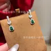 Venta al por mayor de fábrica pequeño rojo departamento material natural peligroso yang verde jade calabaza clip para oreja s925 plata incrustación nuevo diseño chino