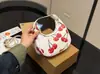 Nova Bolsa em Formato de Meia-Lua Koujia para Mulheres, Bolsa de Ombro com Corrente Tendência e Fashion, Bolsa de Ombro Versátil de Nicho, Adequada para o Dia a Dia e Uso Casual
