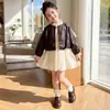 Conjunto Infantil Primavera y Otoño Chaqueta Abrigo de Cuero para Niñas 2026 Nuevo Elegante Vestido Estilo Princesa para Bebé Conjunto de Dos Piezas