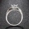 Anillo Clásico Plateado de Seis Garras de 2 Quilates Micro-Pavé para Mujer con Doble Fila de Diamantes y Brazo Retorcido Anillo de Compromiso Boda Diamante para Mujer Venta Directa de Fábrica